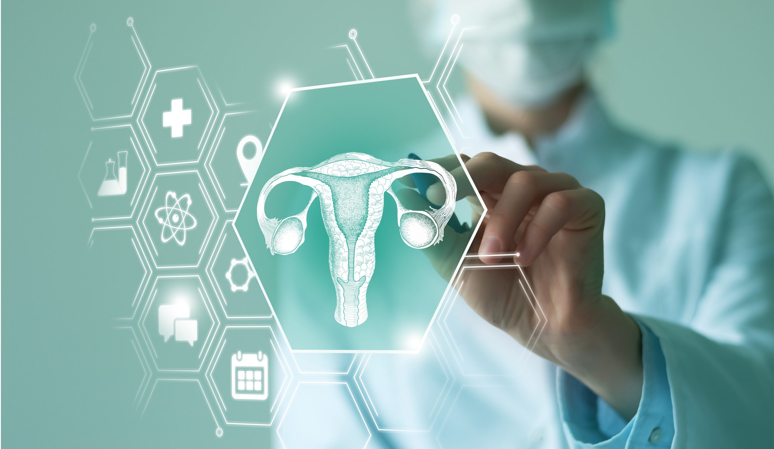 Unrecognizable female doctor holding graphic virtual visualization model of Uterus organ in hands. Multiple virtual medical icons. endometriosis